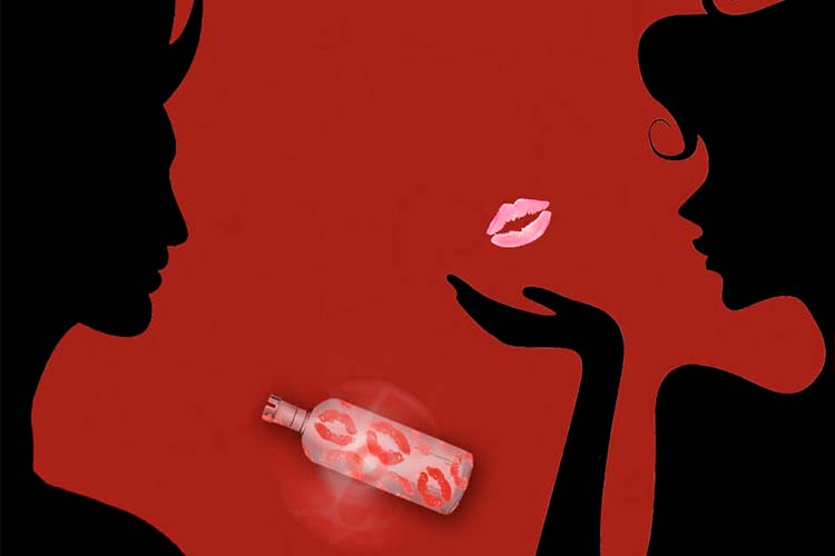 Man and woman kissing after spinning the bottle